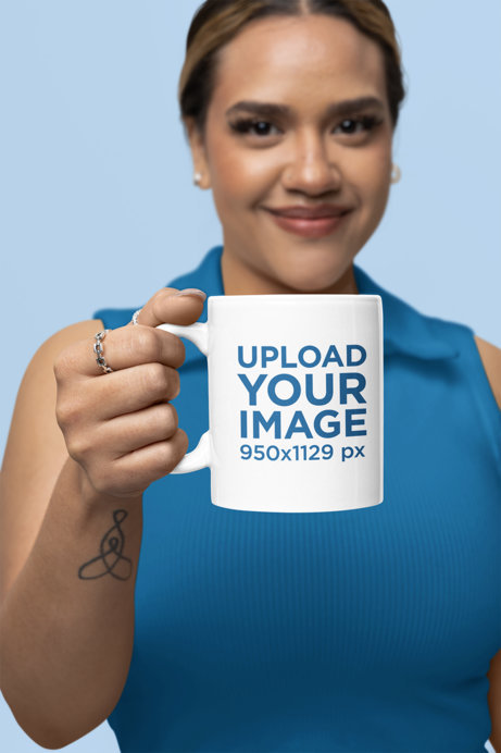 Placeit Mockup of a Smiling Woman Holding an 11 oz Coffee Mug Close