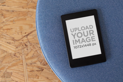 Download Placeit Kindle Paperwhite Mockup Over A Blue Cushion