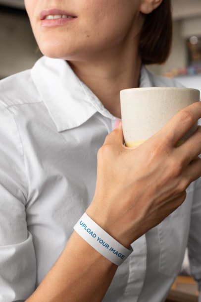 Placeit - Paper Wristband Mockup Featuring a Woman Holding a Coffee Cup