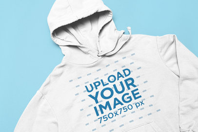 Download Placeit - Mockup of a Heathered Raglan Hoodie Lying Flat ...