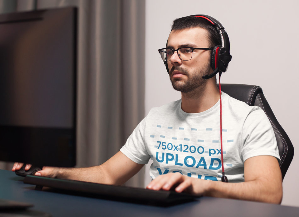 Placeit - T-Shirt Mockup Featuring a Developer Using a Computer