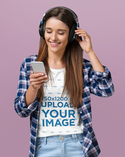 T-Shirt Mockup of a Happy Woman Wearing Headphones to Listen to Music m2388-r-el2