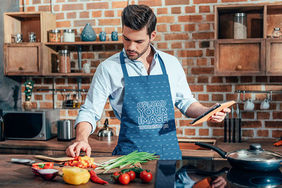 Placeit - Mockup of a Young Cook Wearing a Sublimated Apron